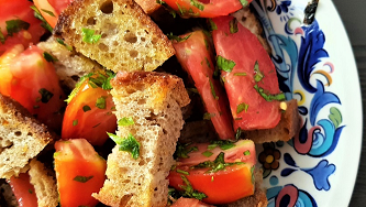 Pomodori alle erbe con pane tostato